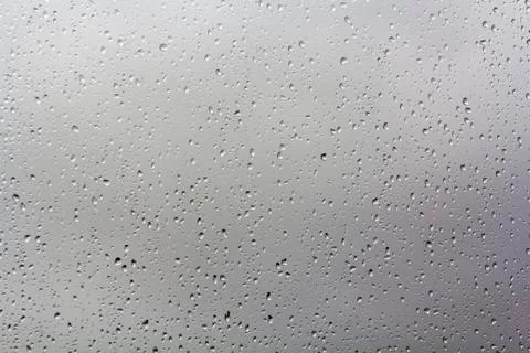 Rain drops on window glass Stock Photos
