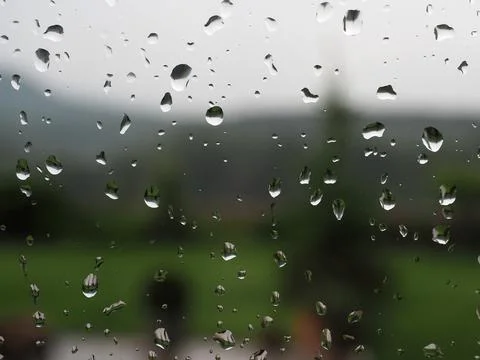 Rain drops on window glass. Stock Photos