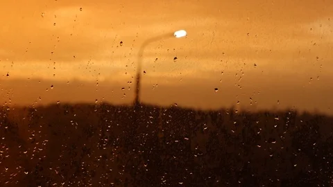 Rain drops on the window glass. Slow motion close-up. Stock Footage 93801570