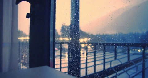 Rain drops on window glass in storm with lightning Stock Footage 210221366