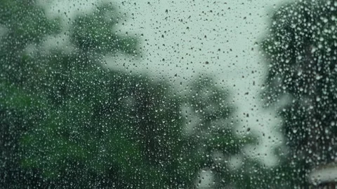 Rain drops on window glass surface. Abstract water droplets on transparent glass Stock Footage 254406413