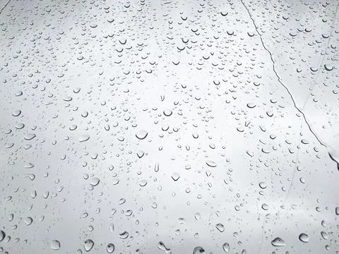 Rain drops on window glass surface Stock Photos