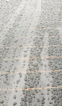 Rain drops on window glasses surface with cloudy background Foto stock