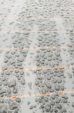 Rain drops on window glasses surface with cloudy background Foto stock