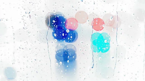 Rain drops on window with moving traffic light Stock Footage 35714198