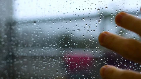 Rain Drops on Window Pane Background - HD Video Stock Footage 340473705