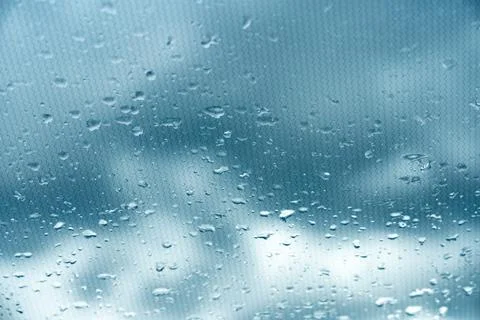 Rain Drops on a Window Pane: Capturing the Beauty of Nature's Tears on a Gloomy Stock Photos