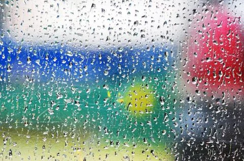 Rain drops on window Stock Photos