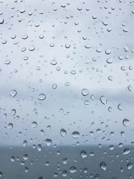 Rain drops on window Stock Photos