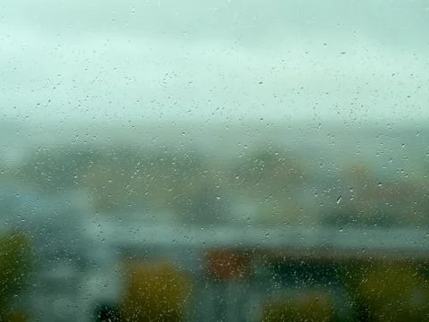 Rain drops on window Stock Photos