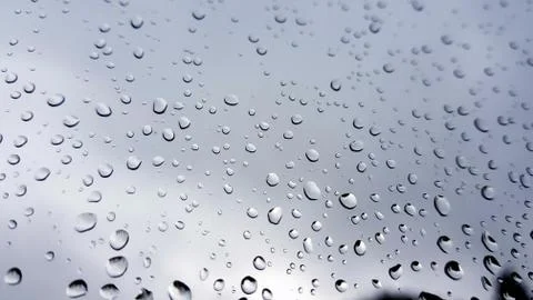 Rain drops on a window Stock Photos