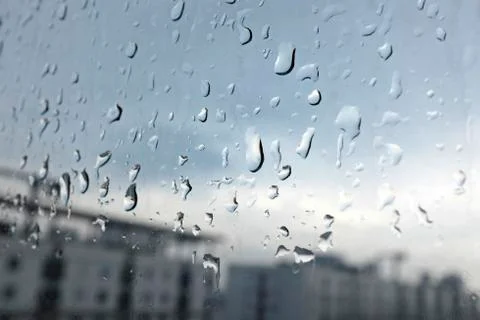 Rain drops at a window Stock Photos