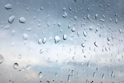 Rain drops at a window Stock Photos