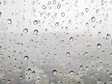 Rain drops on window Stock Photos