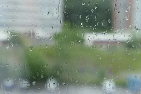 Rain drops on window Stock Photos