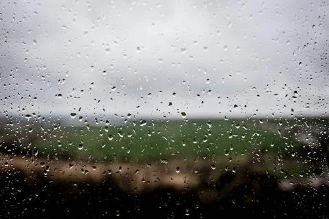 Rain drops on window Stock Photos