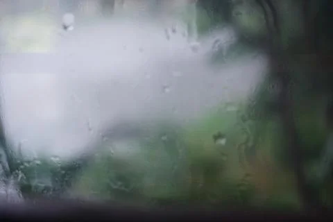 Rain drops on window Stock Photos