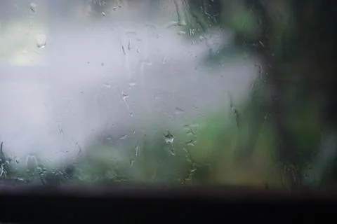 Rain drops on window Stock Photos