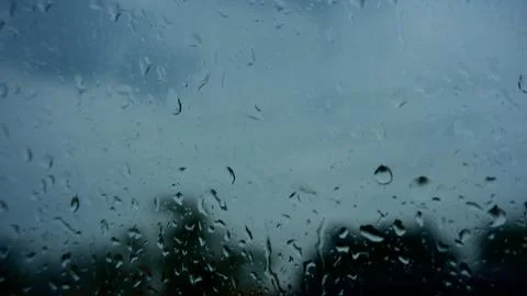Rain drops on window  Stock Photos