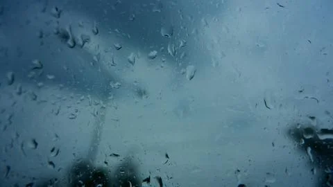 Rain drops on window  Stock Photos