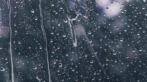 Rain drops on the window surface Stock Footage 144927485