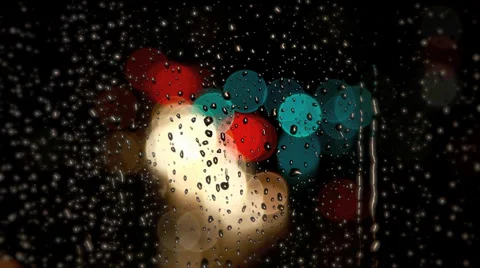 Rain drops on window with traffic light Stock Footage 34849988