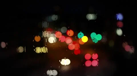 Rain drops on the window with traffic light Stock Footage 67183389