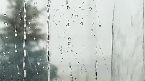 Rain drops on windows glass. Summer shower, close up Stock Footage 133194302