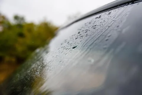 Rain drops on the windscreen of car Stock Photos