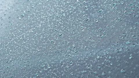 Rain drops on the windshield of the car Stock Footage 106953960