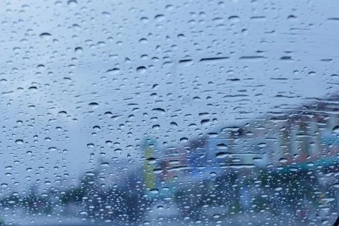 Rain drops on the windshield Stock Photos
