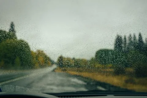 Rain drops on the windshield Stock Photos