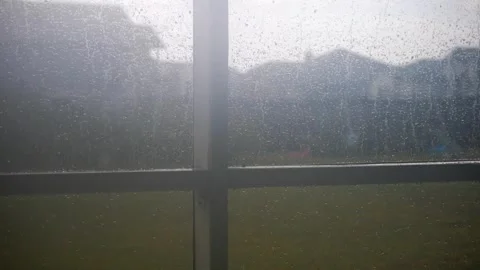 Rain during a short thunderstorm Stock Footage 316543382