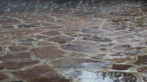 Rain during a thunderstorm fall on the pavement Stock Footage 91175710