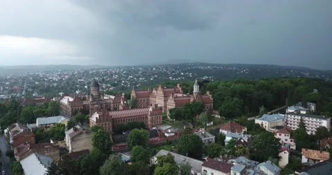 Rain in the evening over the ancient beautiful city of Chernivtsi in June 2020 스톡 동영상 229122265