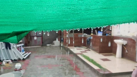 Rain fall water dripping sliding over green cloth Stock-Footage 247734701