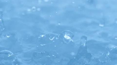 Rain fall into water, Slow Motion Stock Footage 31819460
