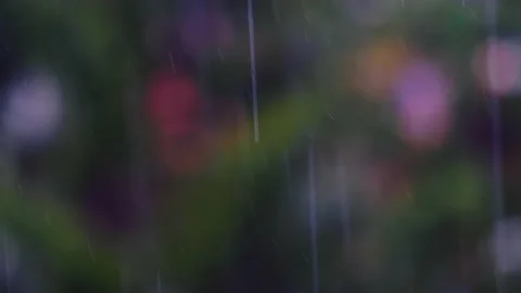 Rain falling and green bokeh Stock Footage 139801160