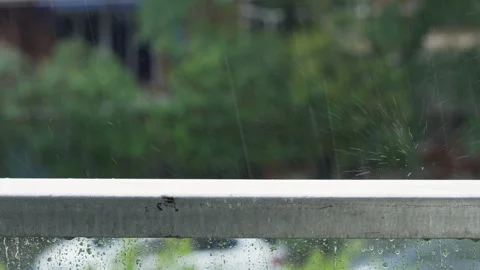 Rain falling and splasing Stock Footage 289727114