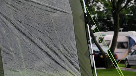 Rain falling and trickling down tent exterior Stock Footage 28691736
