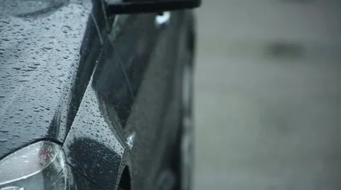 Rain falling on Car Stock Footage 44031732