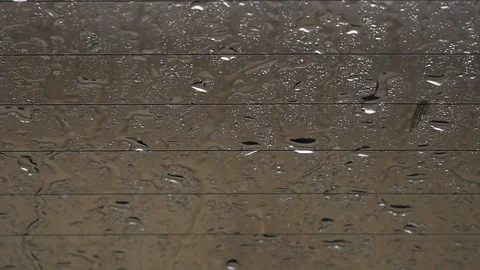 Rain falling on a car window Stock Footage 111605061