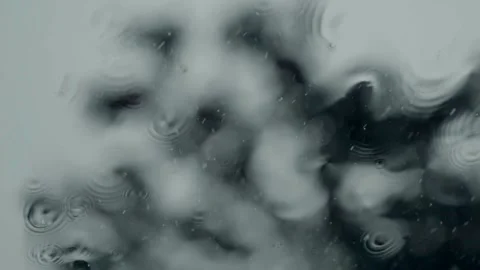 Rain Falling on a Car Windshield Stock Footage 346037057