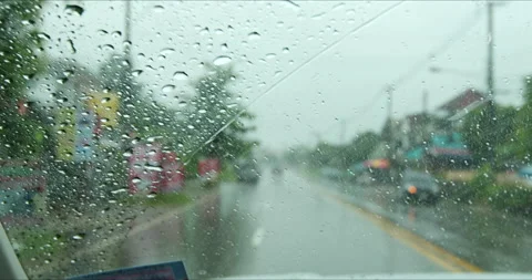 Rain falling on car windshield view. Stock Footage 202875356