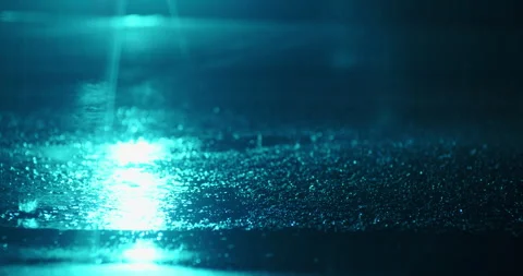 Rain falling on concrete at night. Stock Footage 271206163
