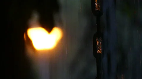 Rain falling down the chain, Slow motion Stock Footage 51685997