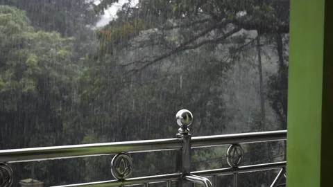 Rain falling in front of the house Stock Footage 240276215