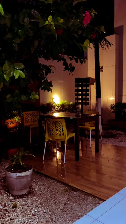 Rain Falling in Garden – Relaxing Scene with Table and Chair Stock Footage 313832465