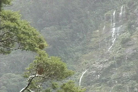 Rain falling on mountain side Stock Footage 745213