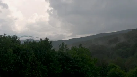 Rain falling in the mountains on a cloudy day, Bieszczady, Poland Stock Footage 152160811